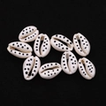 Close-up of white cowrie shells with black polka dot patterns for DIY jewelry making - No. 8 (20 Pieces/pack) / 9x19mm,1.5g