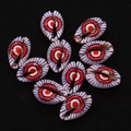 Detail view of ten natural cowrie shells with evil eye prints for DIY jewelry making - No. 4 (20 Pieces/pack) / 9x19mm,1.5g