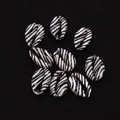 Detailed view of nine zebra striped natural cowrie shells on a black background - No. 6 (20 Pieces/pack) / 9x19mm,1.5g