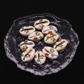 Detailed close-up of natural cowrie shell beads with colorful turtle and star prints - Style 3 (Turtle and Stars Pattern) / 20 Pieces Set
