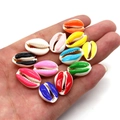 Hand holding colorful glazed natural cowrie shell beads for DIY jewelry making - Mixed Colors (20 Pieces/pack) / 9x19mm,1.5g