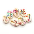 Set of 7 painted natural cowrie shell beads with floral patterns and positive English text - Mixed Colors (20 Pieces Per Pack) / 9x19mm,1.5g