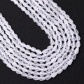 Macro view of faceted white translucent teardrop beads for DIY jewelry making - 4x6MM / White (No. 3)