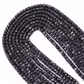 Makroaufnahme von facettierten 4mm schwarzen Edelsteinperlen mit metallischem Glanz für DIY - Schwarz (Nr. 6)