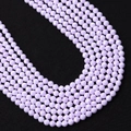 Macro shot of faceted lavender beads for DIY jewelry making with light reflections - 2.0mm / Lavender