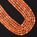 Vista macro de cuentas facetadas de ojo de gato naranja en forma de gota para joyería - Naranja (Color 12)