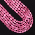 Macro-opname van gefacetteerde roze kattenoogkralen voor DIY sieraden maken - Nr. 9 (Roze) / 4x6MM