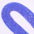 Macro detail of 2.5mm faceted square zircon beads in violet blue for DIY jewelry making - Small / Blue
