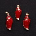 Close-up of three red spiral seashell pendants with gold-plated edges and metal loops - Single Piece / Bright Red (No. 4)