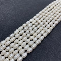 Fil de perles d'eau douce blanches de forme riz pour la création de bijoux DIY - Blanc