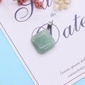 Light green natural stone pendant in a rounded square shape with silver metal bail clasp - Green Aventurine