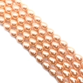 Vue macro de perles en forme de goutte champagne pour la création de bijoux DIY - Petit / Rose Champagne (N°1)