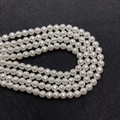 Detail van gefacetteerde crèmewitte parels voor het maken van DIY sieraden kettingen - Nr.5 (Crèmewit Gefacetteerd)