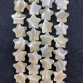 Cuentas de nácar natural en forma de estrella con brillo iridiscente para joyas DIY - Estrella