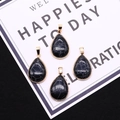 Lot de quatre pendentifs en pierre naturelle en forme de goutte avec bordure dorée et carte - Howlite à Lignes Noires