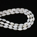 Flat oval natural freshwater white shell beads with lustrous mother of pearl finish - Marquise