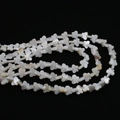Polished natural mother of pearl butterfly beads with iridescent finish for DIY jewelry - Vertical Hole Butterfly Shape