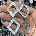 Natural black shell rhombus charm beads with iridescent luster for DIY jewelry making - Hollow Rhombus Shape / 28x38