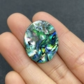 Oval natural abalone paua shell bead with iridescent green and blue luster - 21x26mm