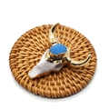 Bull head skull pendant with blue crystal cluster and golden horns on woven mat - White Base Blue Crystal (No. 4)