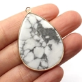 Howlite teardrop stone pendant with gold bezel and natural grey marble textures - Howlite