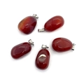 Five irregular red agate stone pendants with silver metal bails on a clean white background - Irregular Style
