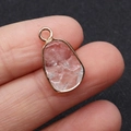 Irregular pink quartz pendant with gold metal trim and top loop for DIY jewelry - Transparent Crystal