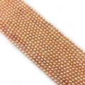 Natural rice-shaped freshwater pearls in orange-pink hue for DIY jewelry design - 4-5mm / Pink