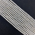 Strands of AAA natural freshwater white pearls in near-round shape for jewelry making - AB Grade / 2-3mm