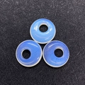Three light blue opal donut stones for DIY jewelry making accessories on black background - 18x4mm Hole 6mm / Opal