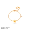 Bracelet fleur en acier inoxydable doré avec gravure Love et pierre de zircon - Or 18 carats / Bracelet Or Rose