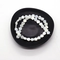 Natürliche weiße Perlmutt-Blumenperlen mit polierter Oberfläche für DIY-Schmuck - 10mm (ca. 22g)