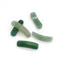 Close-up of five green natural stone curved tube beads for DIY jewelry making and necklaces - Green Aventurine