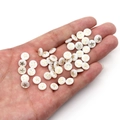 White shell bead with gold starfish design for DIY jewelry making held in palm - Starfish / 6mm (20 Pieces)