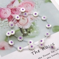 Daisy flower shell beads with purple centers on clear string for DIY jewelry making - Purple Center (No.1) / 10mm (20 Pcs/Strip)