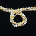 Dettaglio di perline in conchiglia 6mm-9mm con motivi malocchio per creazione di gioielli fai-da-te - N. 9 (ai-Occhio Giallo)