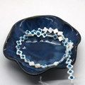 Perles fleurs œil grec en coquillage faites main pour création de bijoux DIY - Forme de fleur à quatre pétales / 8mm (env. 14g/Brin)