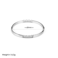 Detailed view of silver titanium steel bangle with 60mm diameter and 16.5g weight - Silver Style 2