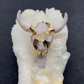 Artistic white acrylic bull skull pendant with gold flake accents and golden bail loop - White And Gold Foil Embellished Style (4) / White And Gold Foil