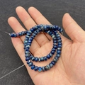 Flat round blue imperial stone spacer beads for DIY jewelry making on elastic cord - 4x6MM / Size 15