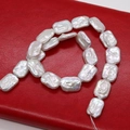 Baroque square freshwater pearls in creamy white with rainbow luster on red background - Rectangle Style / 15x20mm (Approx. 20 pcs/Strand) / White