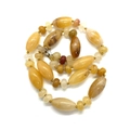 Detail of 10x20mm cylindrical natural stone beads in amber and yellow jade tones - 10x20mm / Yellow Agate Style (5号)