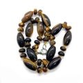Handcrafted tiger eye beaded necklace with oval tube stones and a silver lobster clasp - 10x20mm / Tiger Eye Stone (No. 20)