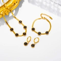 Vintage gold stainless steel jewelry set featuring round cat-eye stones and snake chains - Necklace Bracelet and Earring Set / Black