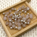 Golden stainless steel chain with oval pink quartz stones and white ABS pearls - Irregular Size Roll / Pink Rose Quartz