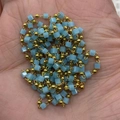 DIY jewelry chain featuring light blue cube beads and golden metal spheres on a palm - 1 Roll / Pale Blue (Color 6)