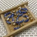 Sodalite natural stone crescent moon pendants with gold clips set of seven pieces - Blue Spot Stone