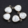 Set of five faceted white howlite water drop pendants with golden metal frames for DIY - Howlite