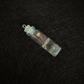 Cylindrical glass pendant with pink dried flower and blue stopper with ring - Light Blue