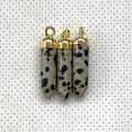 Three faceted Dalmatian Jasper bullet pendants with elegant gold metal caps and bail details - Dalmatian Jasper